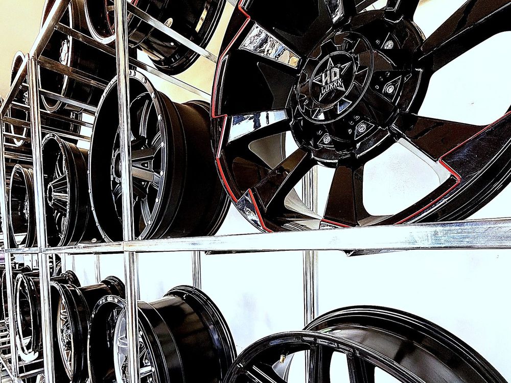 Custom black and red truck wheels in stock at Llantera Del Norte, Aurora CO